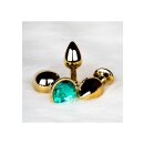 Shots Ouch! Round gemstone anal plug gold emerald green large 4 cm